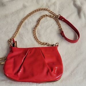 Stylish Red Crossbody Bag with Gold Chain